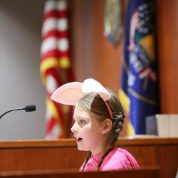 Defendant Curly Pig (Eliza Treu) testifies as third-grade students from Kaysville's Endeavor Elementary conduct a mock trial with 2nd District Court Judge Thomas Kay at the Farmington Courthouse on Tuesday, March 22, 2016. The trial focused on the case of Big Bad Wolf vs. Curley the Pig. Big Bad Wolf was acquitted. Utah State Court judges are encouraged to take an active part in the community to increase public understanding and promote public confidence in the judiciary. As part of this effort, Kay conducted the mock trial with students playing prosecuting and defense attorneys, witnesses, victims, the defendant, jurors, and courtroom personnel. 