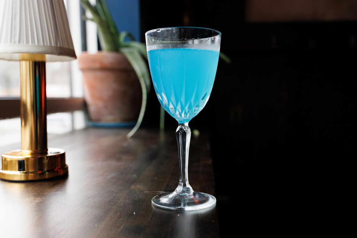 A vibrant blue take on the classic el presidente cocktail at Whoopsie’s in Atlanta.