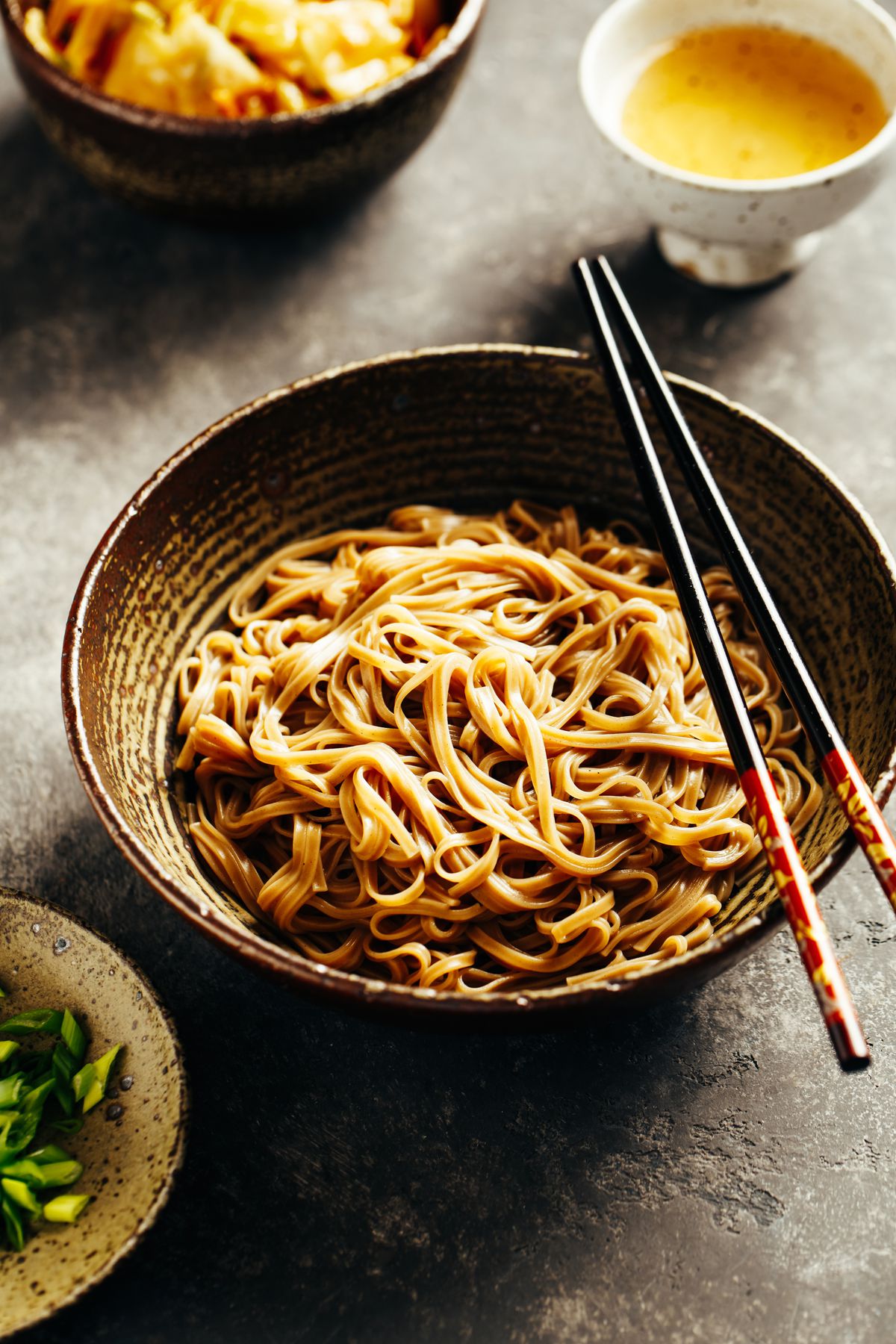 Enjoy a bowl of soba noodles on New Year’s Eve. They’re thought to symbolize long life.
