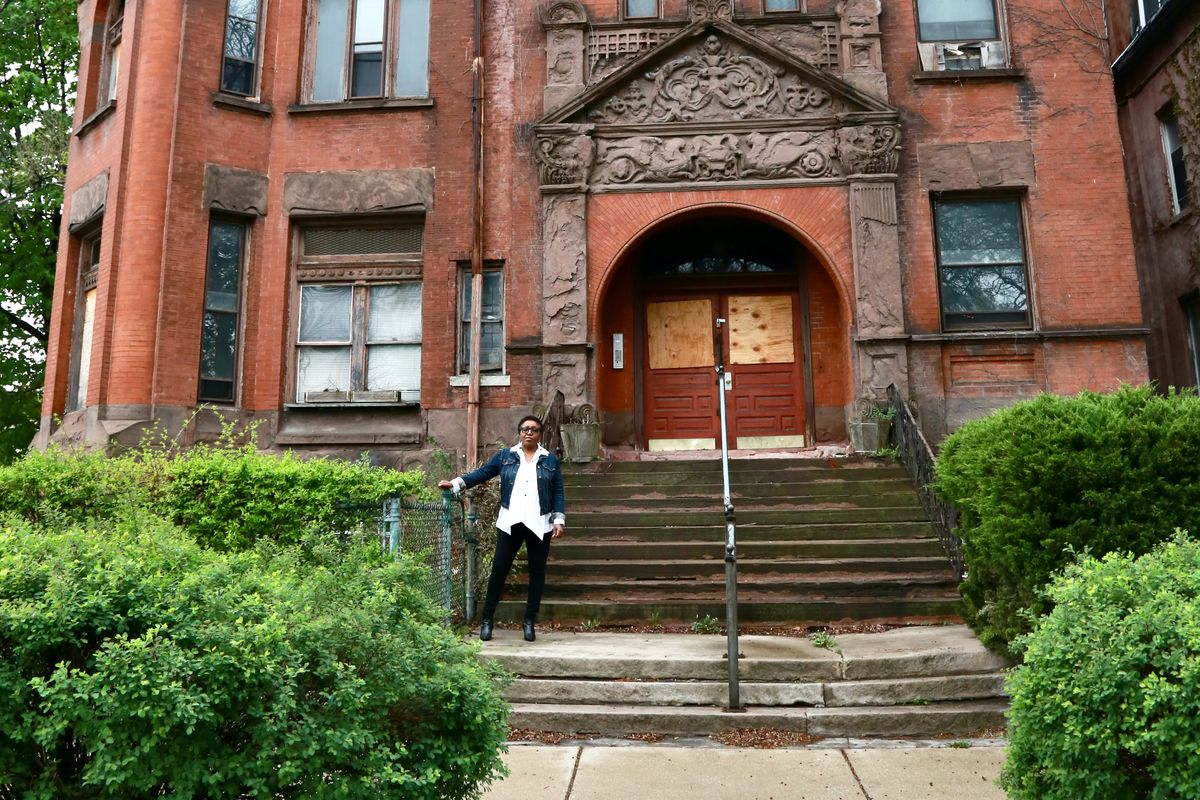 On April 22, Angela Ford of The Obsidian Collection closed on a $1.25 million loan to become new owner of Bronzeville’s long vacant historic Lu Palmer Mansion. Ford is free to establish a museum, library and archive there, and is frustrated by the process to obtain a zoning change from the alderman to rent meeting space and offer modest retail.