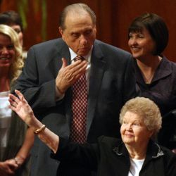 President Thomas S. Monson sends his wife Frances a kiss while leaving the General Relief Society Meeting at the Conference Center on Temple Square in Salt Lake City on Saturday, Sept. 29, 2012.