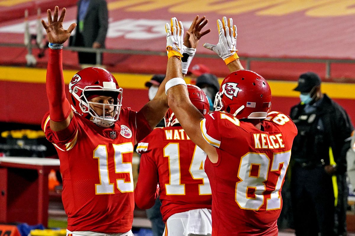 Kansas City Chiefs quarterback Patrick Mahomes and tight end Travis Kelce celebrate after a touchdown during the first half against the Houston Texans at Arrowhead Stadium.