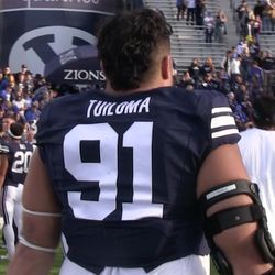 BYU junior defensive tackle Handsome Tanielu, who normally wears the No. 92, wore the No. 91 jersey of Tuiloma during the Cougars' 51-9 win over Massachusetts on Saturday, Nov. 19, 2016. Tanielu did this to honor Tuiloma, who injured his knee earlier in the year against Boise State and required season-ending surgery.