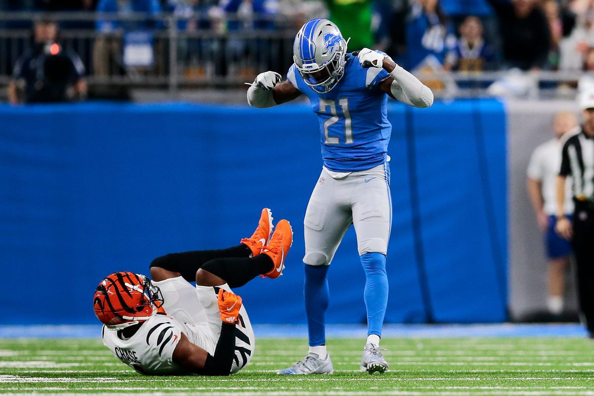 Detroit Lions free safety Tracy Walker III (21) stands and flexes over Cincinnati Bengals wide receiver Ja’Marr Chase (1) as he s called for a taunting penalty in the first quarter of the NFL Week 6 game between the Detroit Lions and the Cincinnati Bengals at Ford Field in Detroit on Sunday, Oct. 17, 2021.