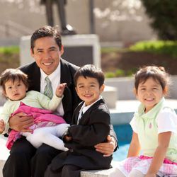 The Ramirez family, from Guatemala, play around the fountain while enjoying the Sunday morning session of the 183rd Annual General Conference of The Church of Jesus Christ of Latter-Day Saints Sunday, April 7, 2013.