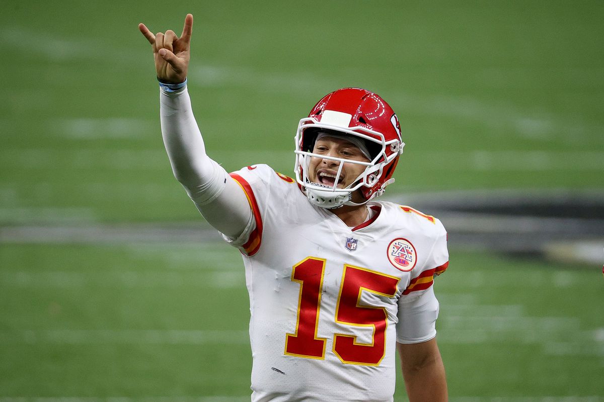 Patrick Mahomes #15 of the Kansas City Chiefs signals for a two-point conversion against the New Orleans Saints during the fourth quarter in the game at Mercedes-Benz Superdome on December 20, 2020 in New Orleans, Louisiana.