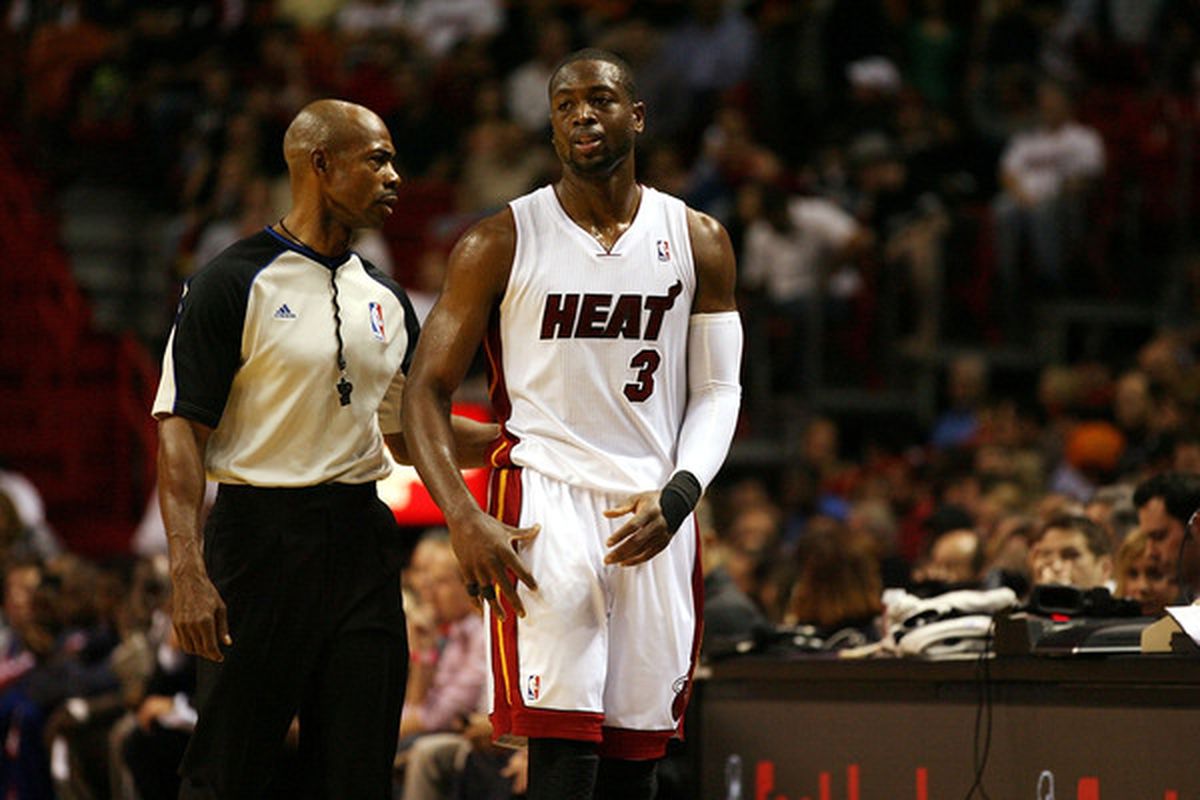 MIAMI - NOVEMBER 26:  Guard Dwyane Wade #3 of the Miami Heat talks to the referee against the Philadelphia 76ers at American Airlines Arena on November 26 2010 in Miami Florida. The Heat defeated the 76ers 99-90.  (Photo by Marc Serota/Getty Images)
