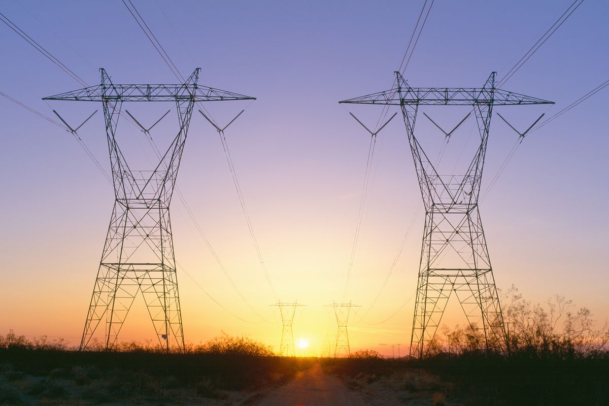 Sunset on electrical transmission towers near Lancaster, California.