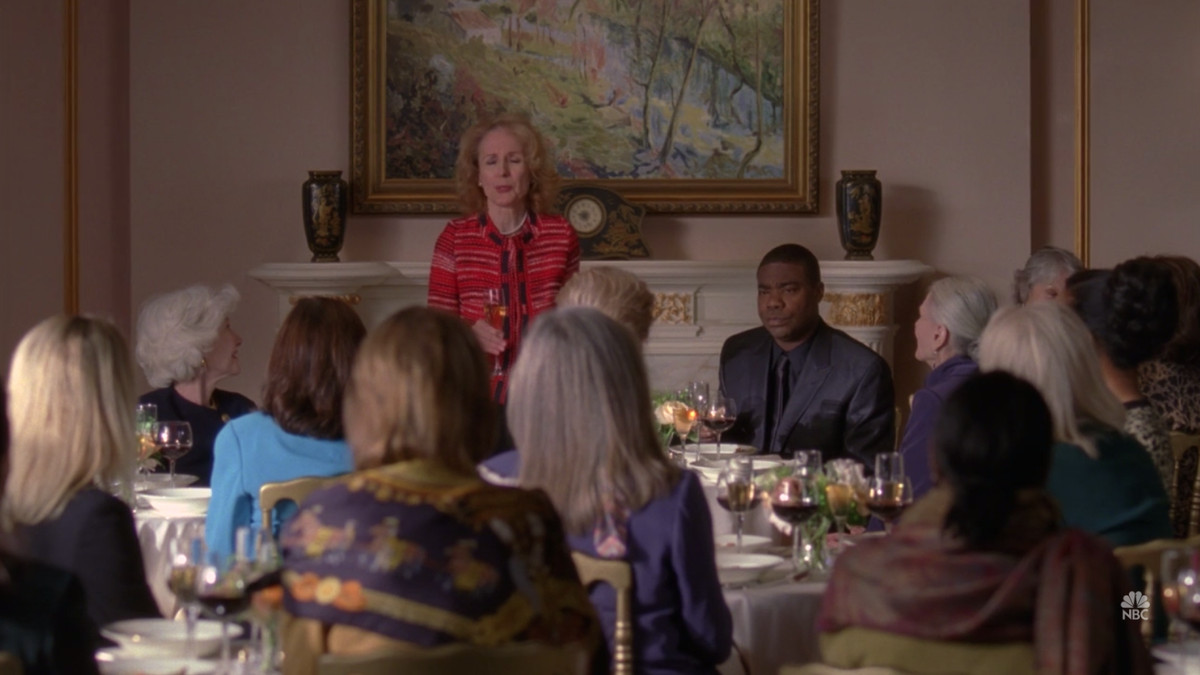 Tracy Jordan and older women sitting around a big table in ‘30 Rock’