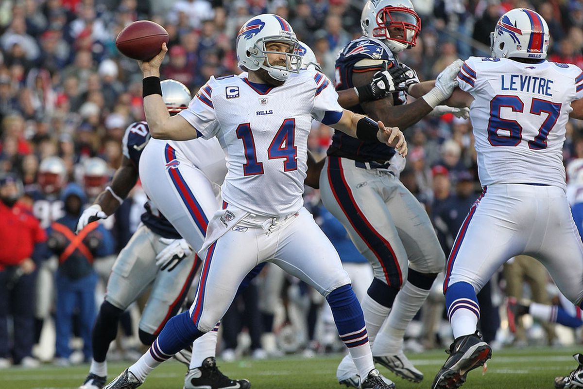 FOXBORO, MA - JANUARY 1:   Ryan Fitzpatrick #14 of the Buffalo Bills throws against the New England Patriots in the first half at Gillette Stadium on January 1, 2012 in Foxboro, Massachusetts. (Photo by Jim Rogash/Getty Images)