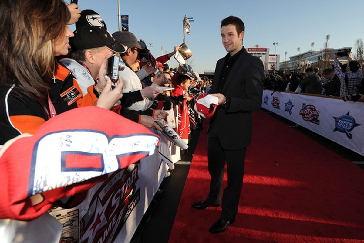 RALEIGH NC - JANUARY 29:  Cam Ward #30 of the Carolina Hurricanes and Team Staal arrives at the NHL All-Star red carpet part of 2011 NHL All-Star Weekend on January 29 2011 in Raleigh North Carolina.  (Photo by Harry How/Getty Images)