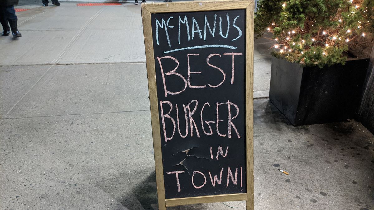 A chalkboard sign reads Best Burger In Town.