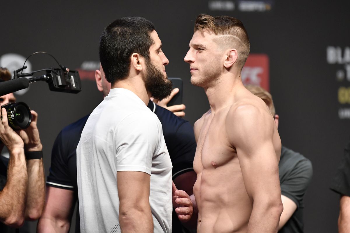 OCTOBER 29: (L-R) Opponents Islam Makhachev of Russia and Dan Hooker of New Zealand face off during the UFC 267 ceremonial weigh-in at Etihad Arena on October 29, 2021 in Yas Island, Abu Dhabi, United Arab Emirates.