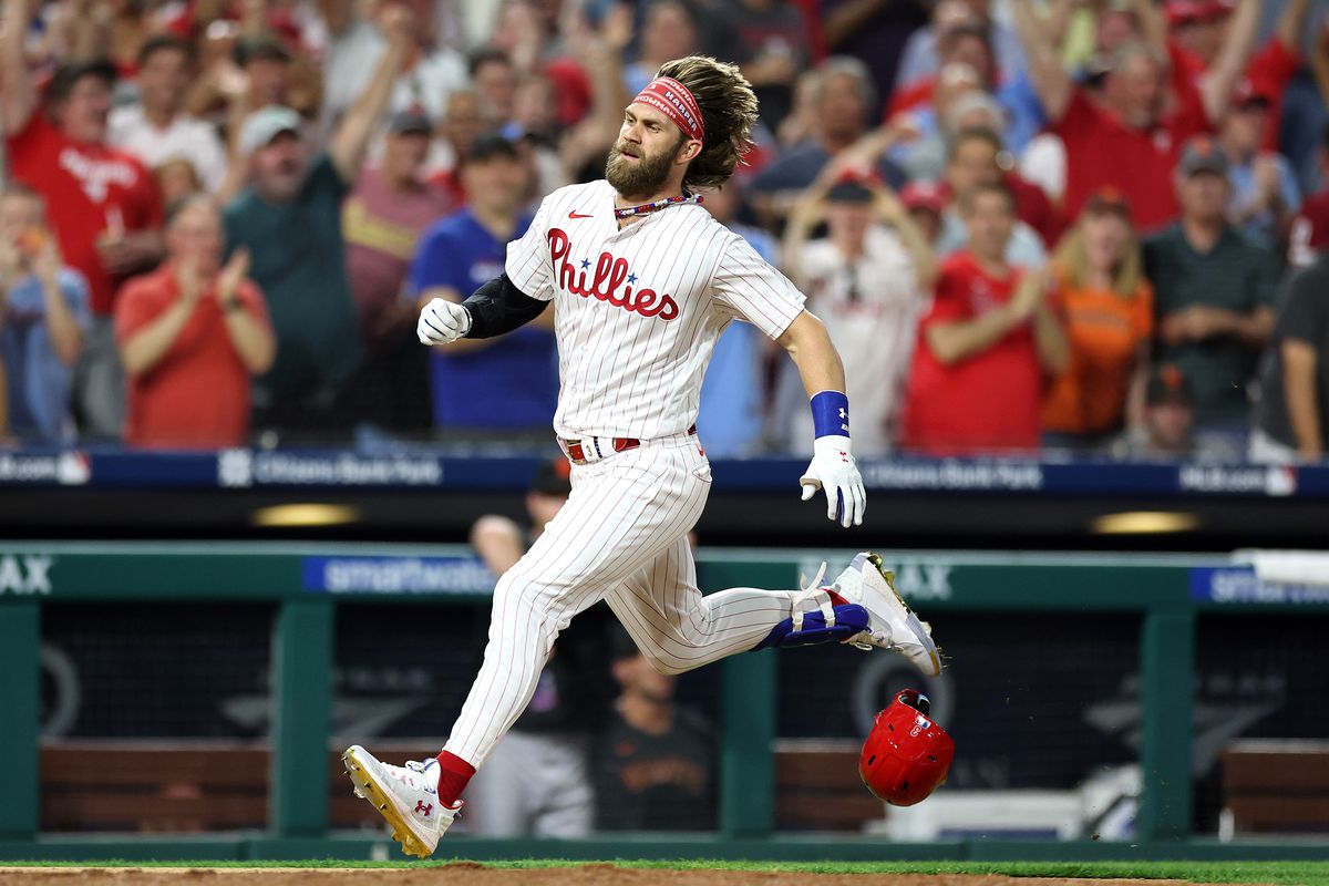 Bryce Harper of the Philadelphia Phillies rounds bases to score an inside the park home run during the fifth inning against the San Francisco Giants at Citizens Bank Park on August 21, 2023 in Philadelphia, Pennsylvania.