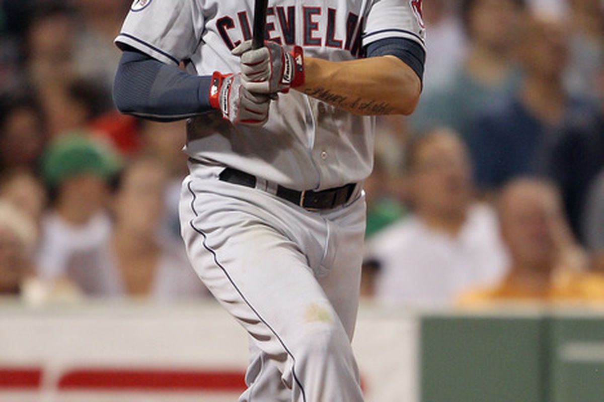 BOSTON, MA - AUGUST 01:  Asdrubal Cabrera #13 of the Cleveland Indians hits a two run homer in the sixth inning against the Boston Red Sox on August 1, 2011 at Fenway Park in Boston, Massachusetts.  (Photo by Elsa/Getty Images)