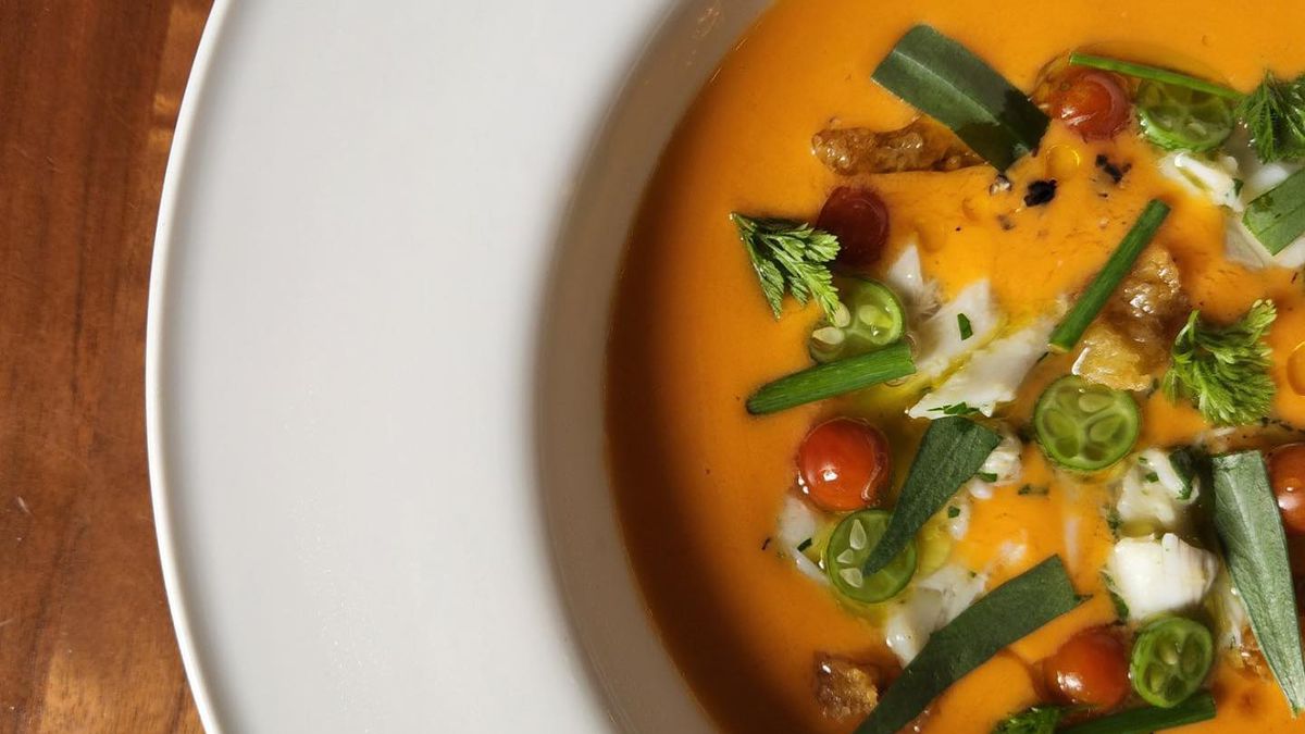 Chilled tomato soup with gulf crab, fried sourdough, cucamelon, and fines herbs from Spring in Marietta, GA. 