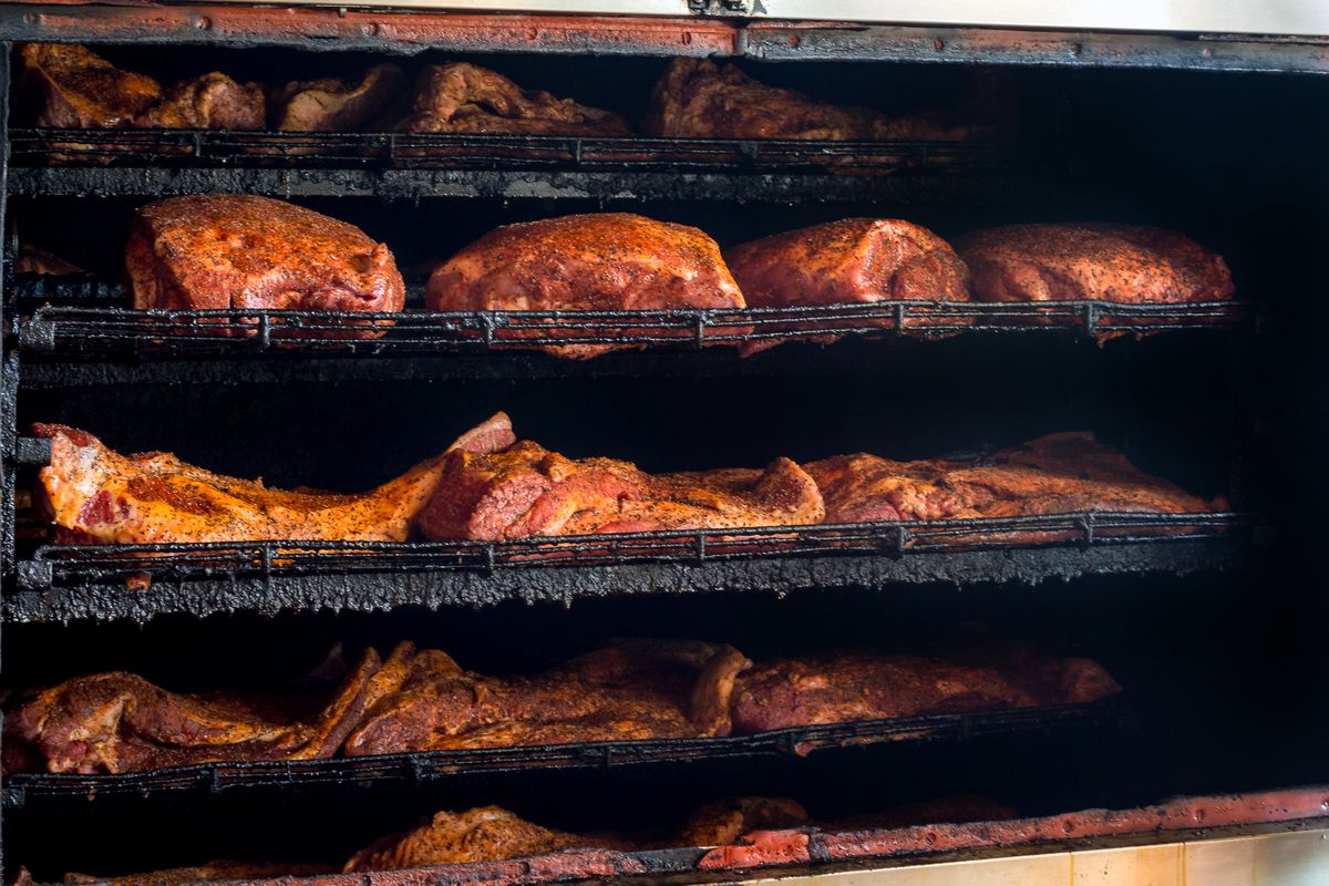The Brisket House's pit stays stocked full.
