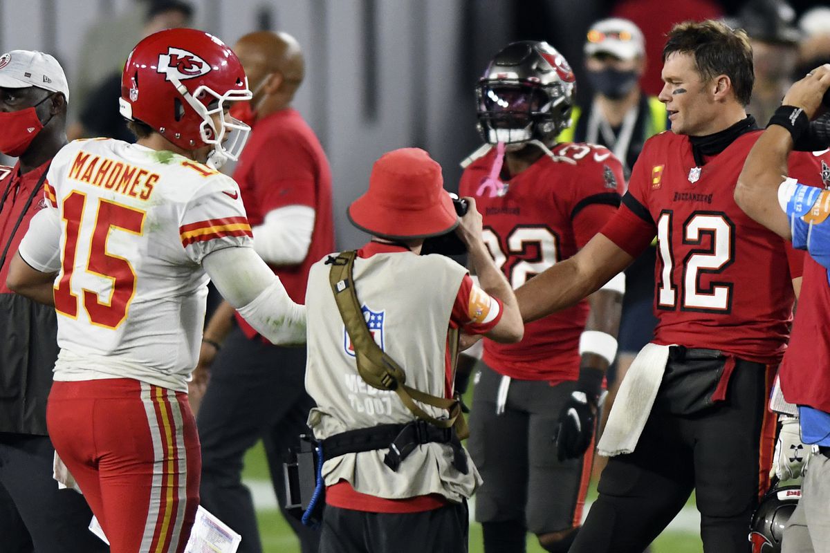 Chiefs quarterback Patrick Mahomes (left) and Buccaneers quarterback Tom Brady (right) shake hands after the Chiefs’ 27-24 victory over the Buccaneers on Nov. 29 at Raymond James Stadium in Tampa.