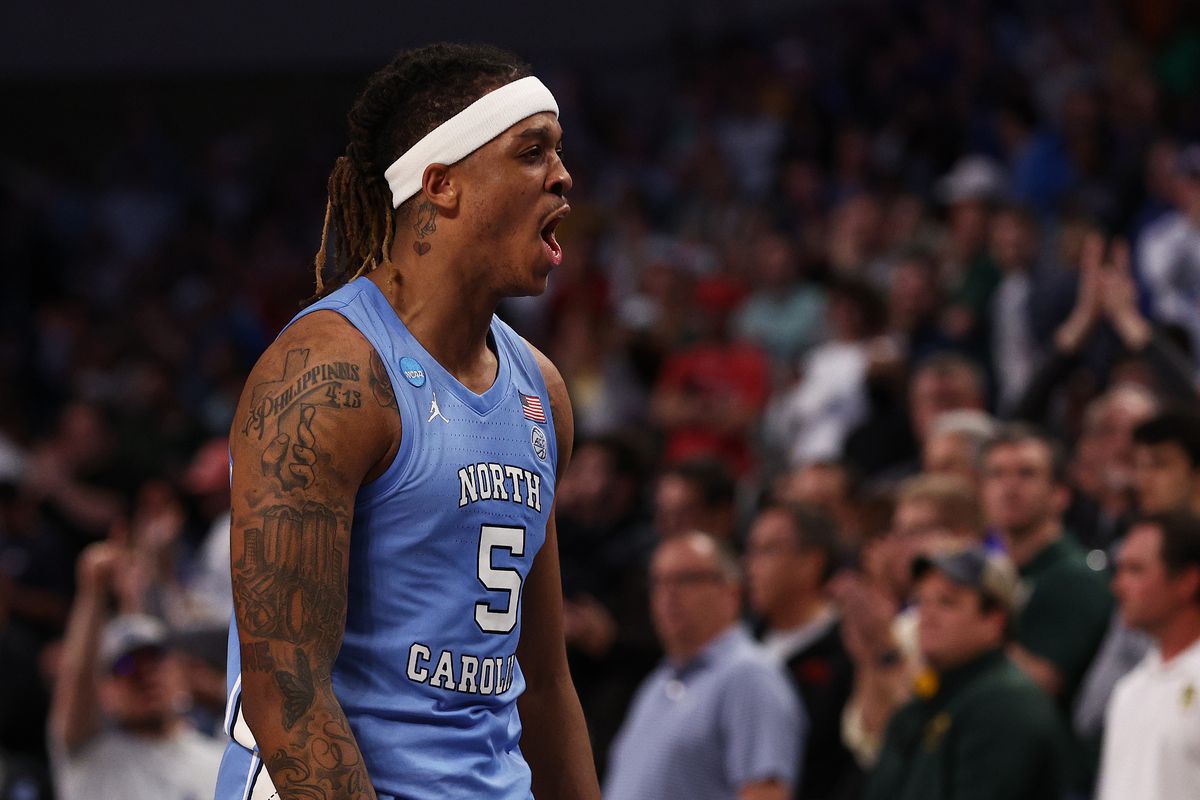Armando Bacot of the North Carolina Tar Heels reacts after defeating the Baylor Bears 93-86 in overtime during the second round of the 2022 NCAA Men’s Basketball Tournament at Dickies Arena on March 19, 2022 in Fort Worth, Texas.