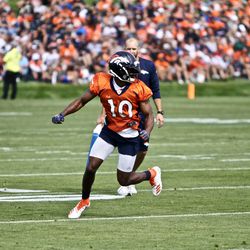 Broncos WR Emmanuel Sanders turns to find the ball.