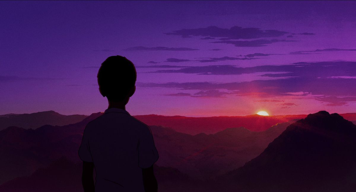 A silhouette of a young animated boy overlooking a sunrise cresting over a plane of mountains from the peak of a mountain.