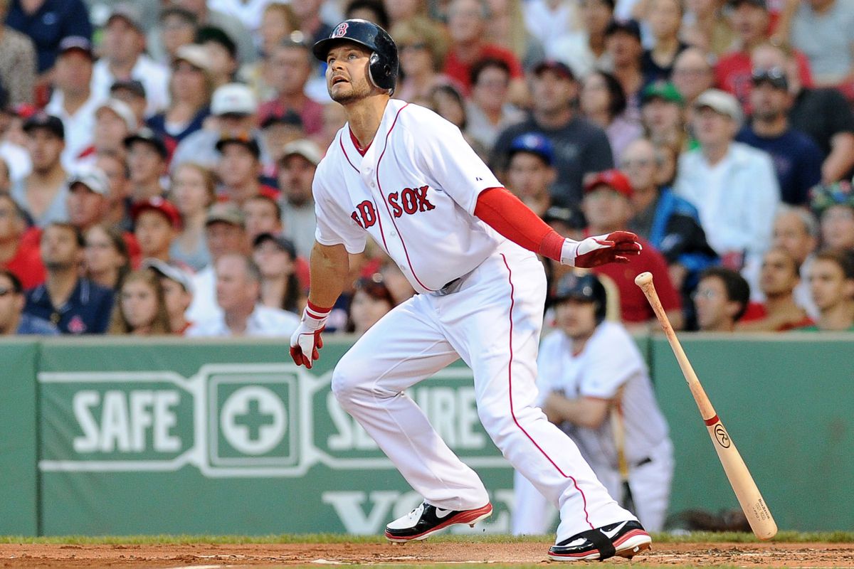 Boston, MA, USA; Boston Red Sox right fielder Cody Ross (7) hits a double during the second inning against the Toronto Blue Jays at Fenway Park. Mandatory Credit: Bob DeChiara-US PRESSWIRE
