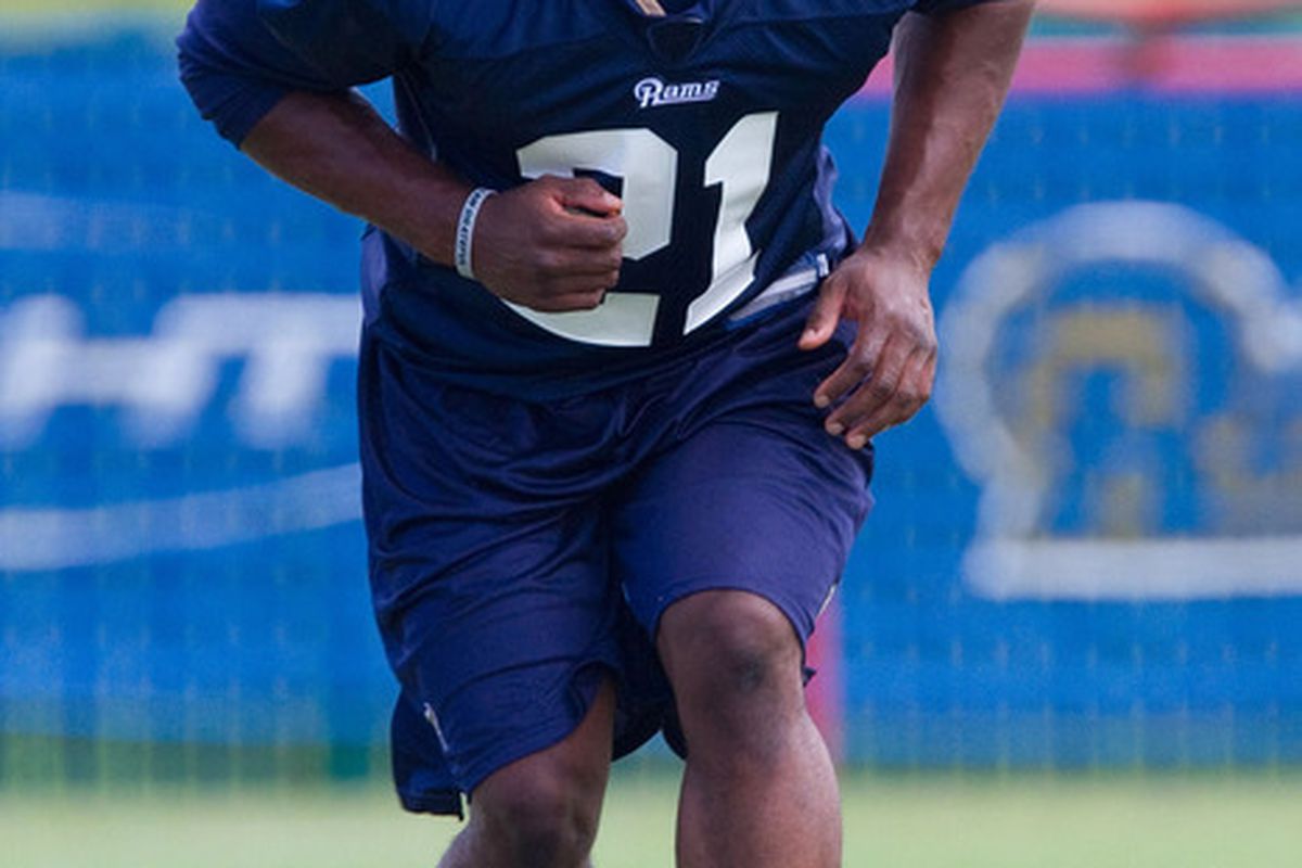EARTH CITY MO - JULY 31: Oshiomogho Atogwe #21 of the St. Louis Rams warms up during training camp at the Russell Athletic Training Facility on July 31 2010 in Earth City Missouri.  (Photo by Dilip Vishwanat/Getty Images)