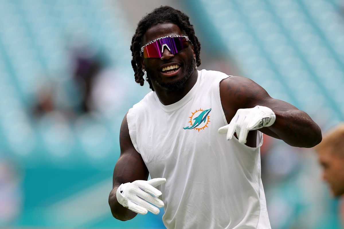 Tyreek Hill #10 of the Miami Dolphins warms up prior to playing the Minnesota Vikings at Hard Rock Stadium on October 16, 2022 in Miami Gardens, Florida.