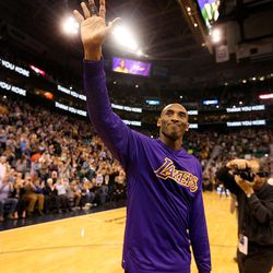 Los Angeles Lakers star Kobe Bryant acknowledges the applause from the crowd at the Utah Jazz game at the Vivint Smart Home Arena in Salt Lake City on Monday, March 28,  2016.  