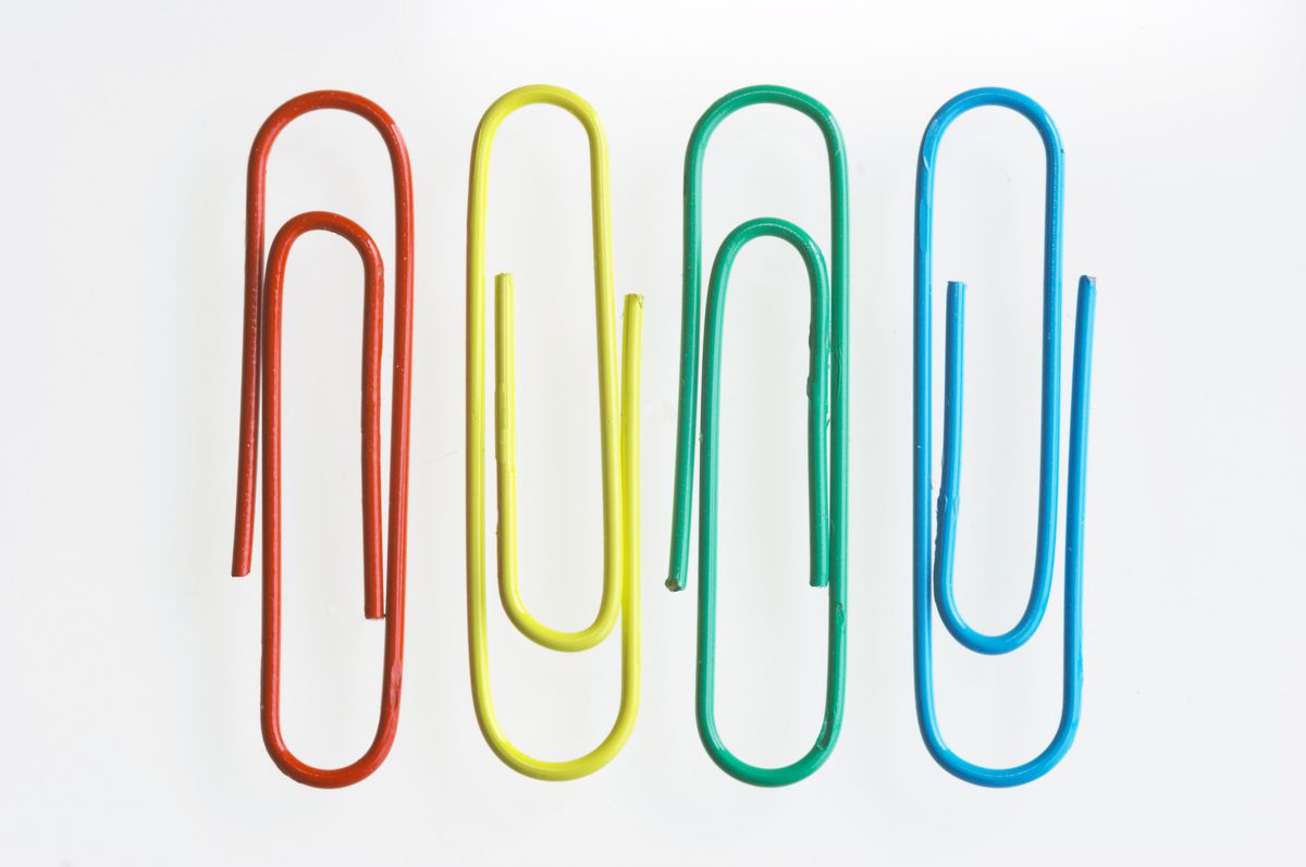 four paper clips: red, yellow, green, blue