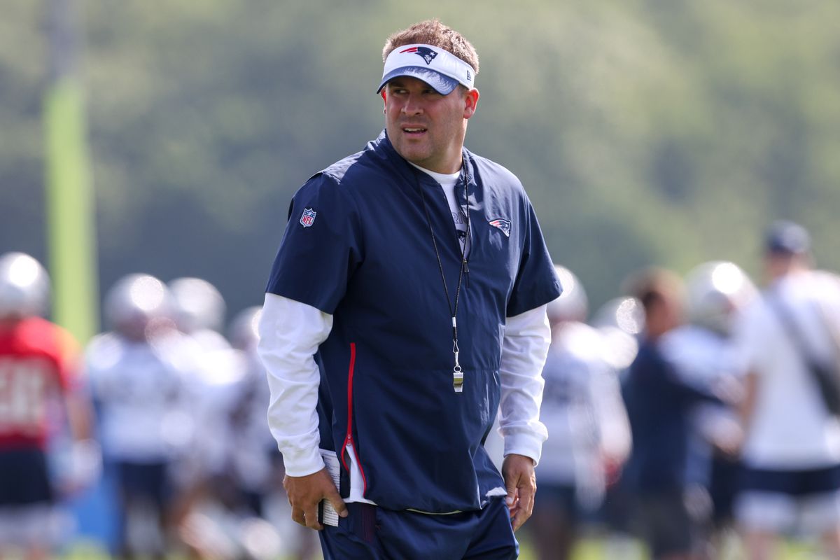New England Patriots offensive coordinator Josh McDaniels reacts during training camp at Gillette Stadium.