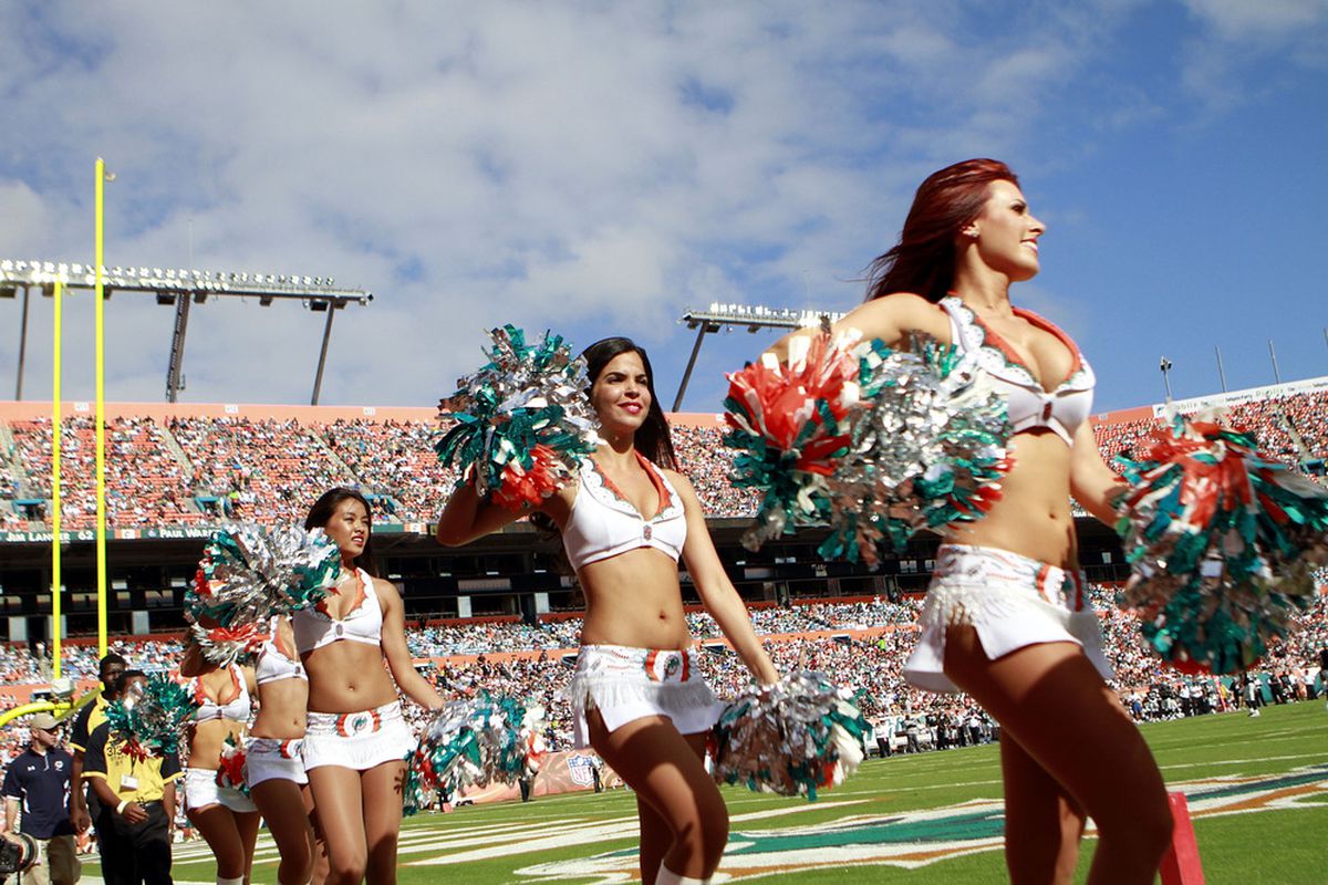 MIAMI GARDENS, FL - DECEMBER 04: Cheerleaders perform as the Miami Dolphins take on the Oakland Raiders at Sun Life Stadium on December 4, 2011 in Miami Gardens, Florida.  (Photo by Marc Serota/Getty Images)