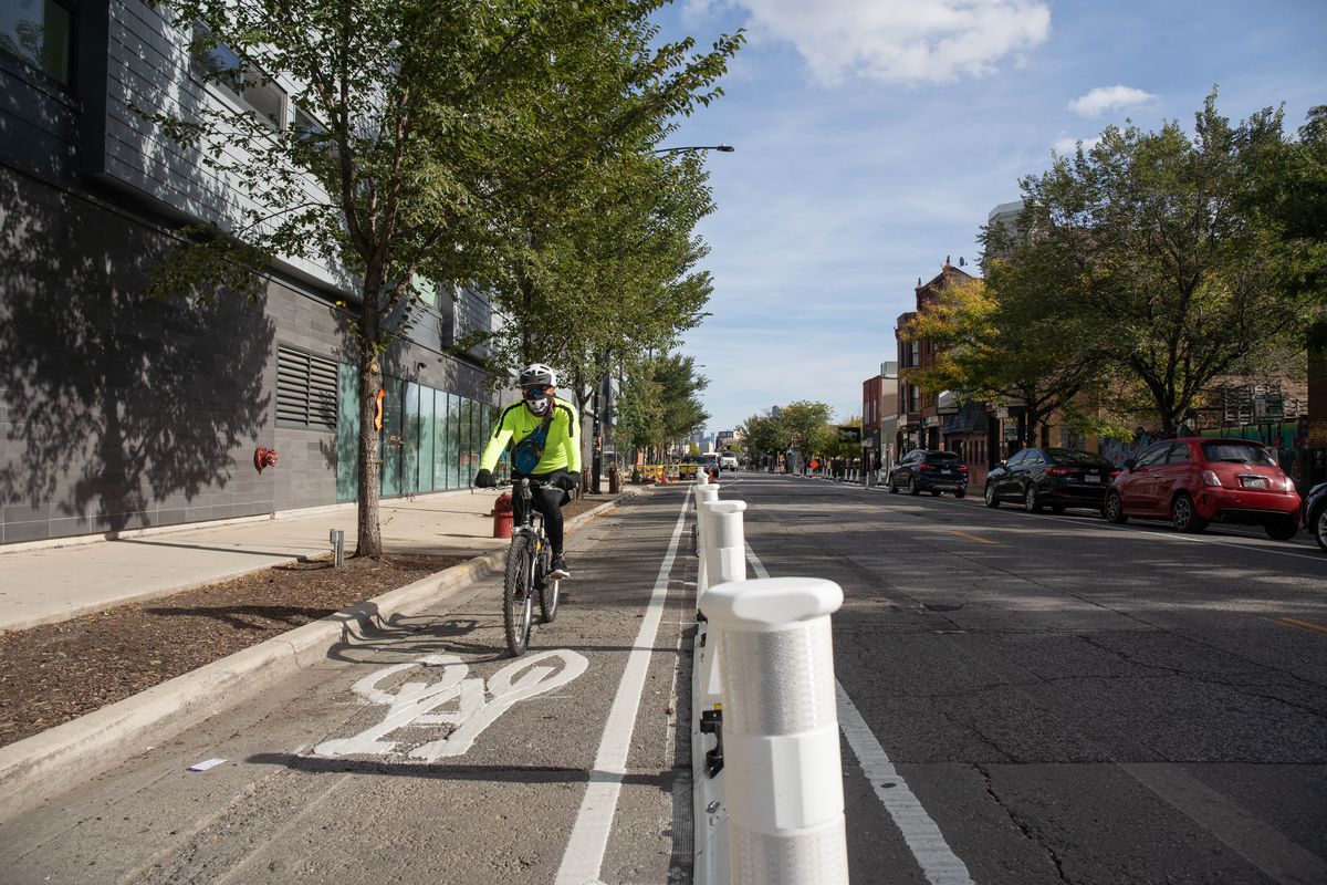 A protected bike lane added near North Milwaukee Avenue and North Washtenaw Avenue in Palmer Square in October 2020.