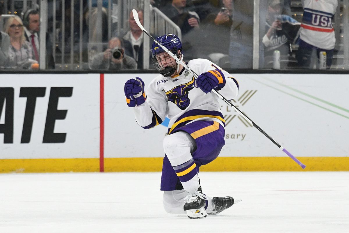 Minnesota State Mavericks defenseman Benton Maass celebrates after scoring a goal against the Minnesota Golden Gophers during the second period of the 2022 Frozen Four college ice hockey national semifinals at the TD Garden.