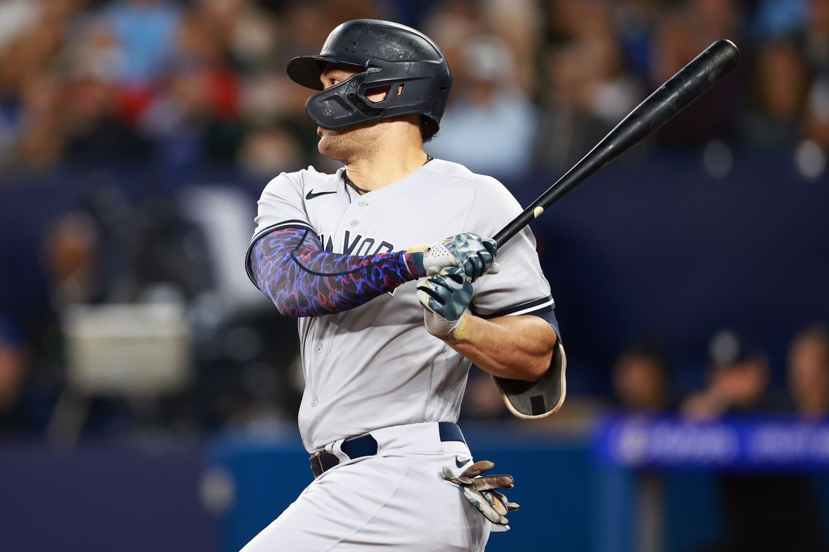 Giancarlo Stanton of the New York Yankees hits a double in the second inning against the Toronto Blue Jays at Rogers Centre on September 28, 2023 in Toronto, Ontario, Canada.