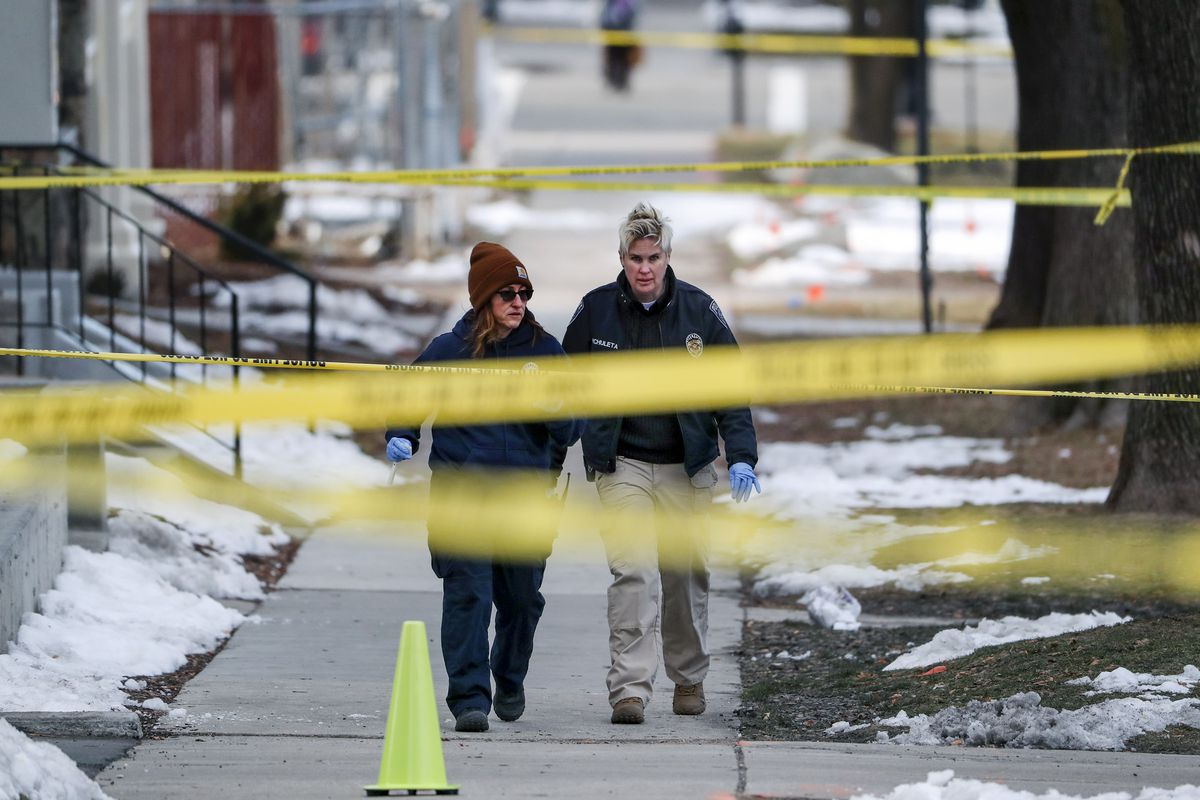 Police investigate an officer-involved shooting after responding to a downtown disturbance in Salt Lake City, on Monday, Feb. 10, 2020.