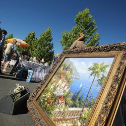 Shoppers browse during the 3rd annual Urban Flea Market in Salt Lake City Sunday, June 9, 2013.