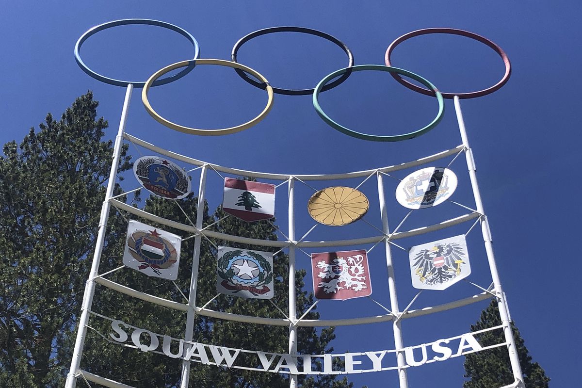 The  Olympic rings stand atop a sign at the entrance to the Squaw Valley Ski Resort in Olympic Valley, California. The site was the scene of the 1960 Winter Olympics.
