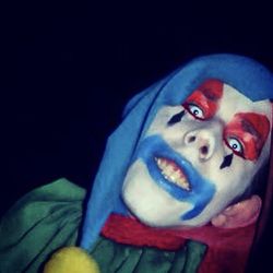 Taylor Lewis worked as a clown at Cornbelly's Insanity Point in 2011.