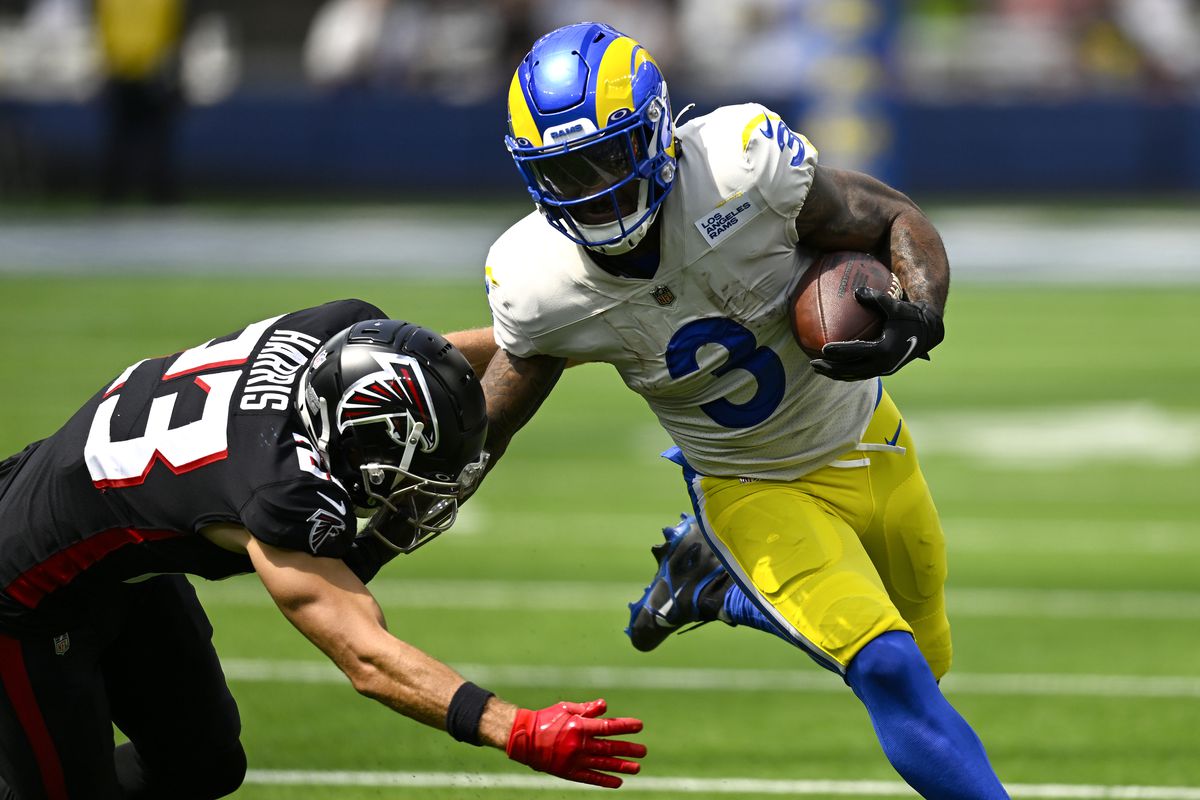 Cam Akers #3 of the Los Angeles Rams carries the ball past Nick Kwiatkoski #53 of the Atlanta Falcons during the second quarter at SoFi Stadium on September 18, 2022 in Inglewood, California.
