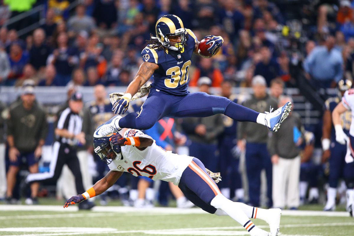 Todd Gurley leaps over former Giants safety Antrel Rolle.
