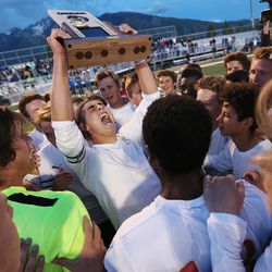 Viewmont's Marshall Johnson celebrates with teammates after beating Fremont in the 5A state high school championship in Draper on Thursday, May 26, 2016. Viewmont won, 4-2.