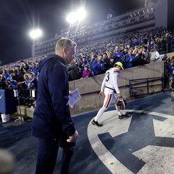 Virginia Cavaliers head coach Bronco Mendenhall walks off the field as fans cheer for him and thank him as BYU defeats Virginia at LaVell Edwards Stadium in Provo on Saturday, Oct. 30, 2021. BYU won 66-49.