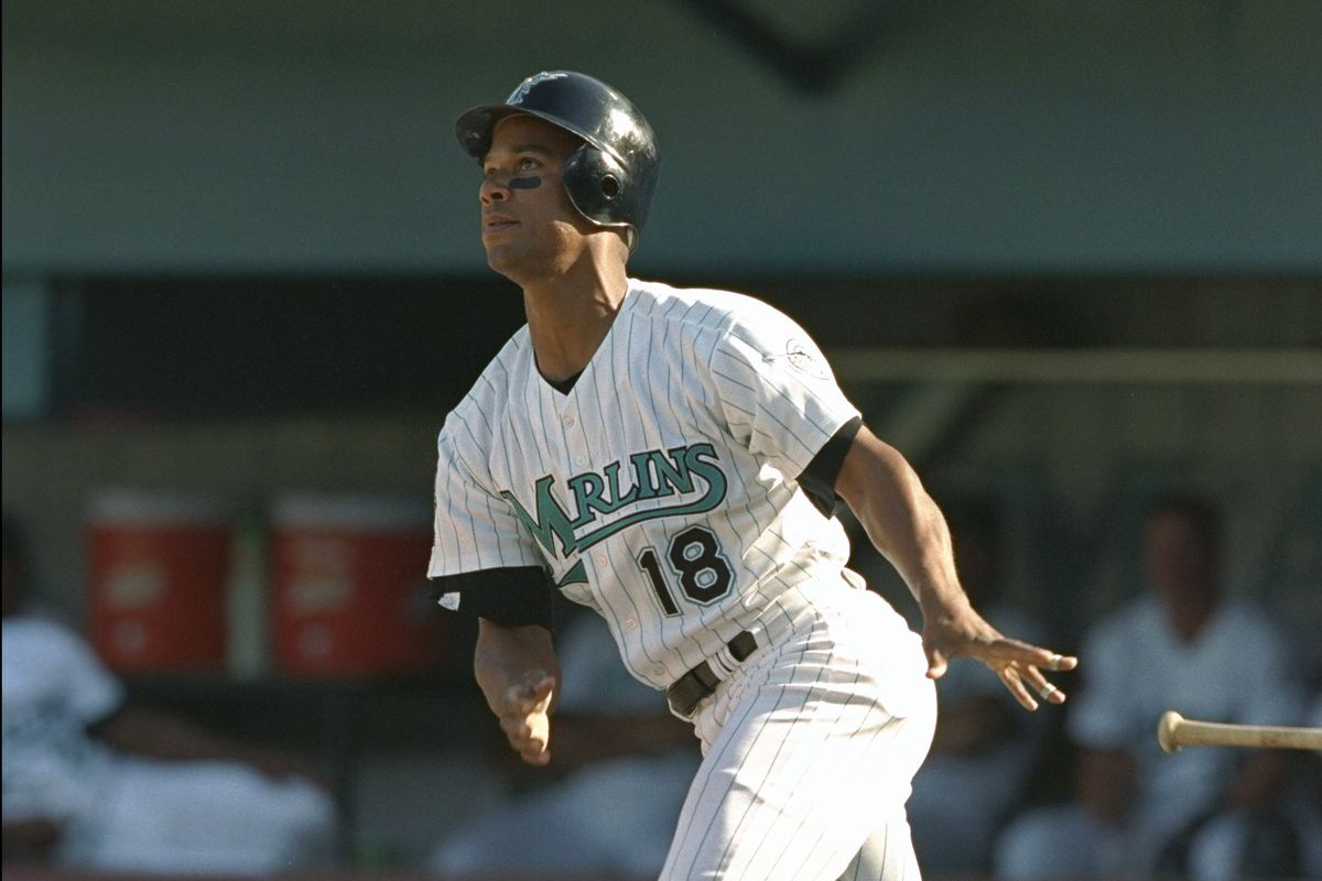 Moises Alou #18 of the Florida Marlins hits a home run during his first at bat as a Marlin in the second inning of the Marlins 4-2 Opening Day win over the Chicago Cubs on April 1, 1997 at Pro Player Stadium in Miami, Florida.