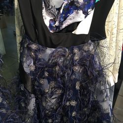 Spring 2015 sleeveless dress with feathers, $1,899 (was $9,495)