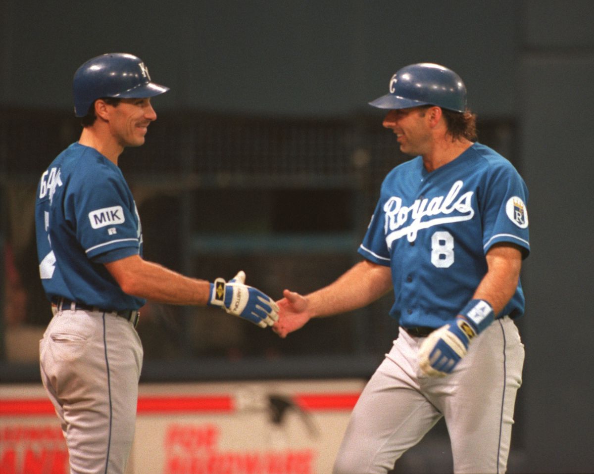 (Left to right) Former Minnesota Twin Greg Gagne congratulates former Minnesota Twin Gary Gaetti after Gaetti’s second homerun for the Kansas City Royals which made the score 8-0 in the 7th inning