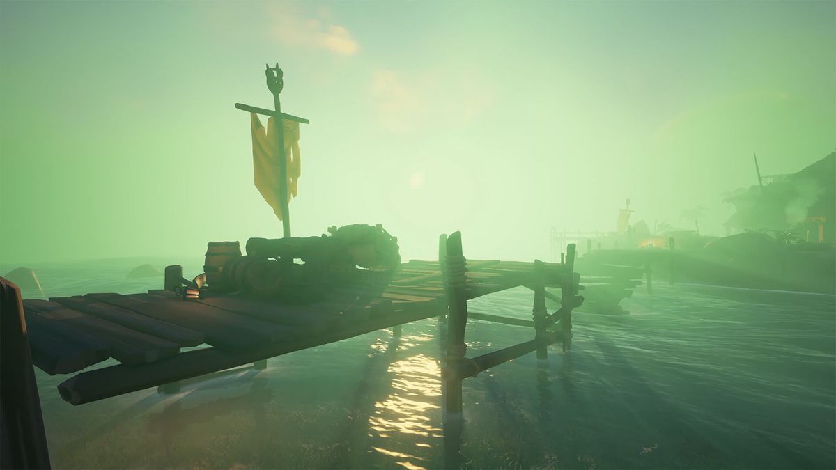 Sea of Thieves - Golden Sands Outpost, a trading settlement in Sea of Thieves, engulfed in a mysterious fog.
