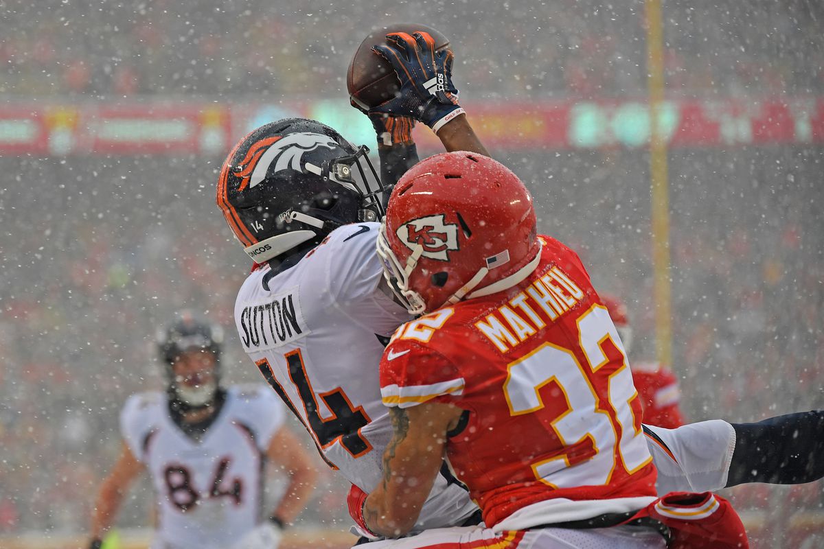 Strong safety Tyrann Mathieu of the Kansas City Chiefs breaks up a pass in the end zone intended for wide receiver Courtland Sutton of the Denver Broncos during the first half at Arrowhead Stadium on December 15, 2019 in Kansas City, Missouri.