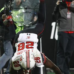 Utah running back Joe Williams flies in the air after being hit by Colorado defensive back Ahkello Witherspoon in the second half of an NCAA college football game Saturday, Nov. 26, 2016, in Boulder, Colo. Colorado won 27-22. (AP Photo/David Zalubowski)