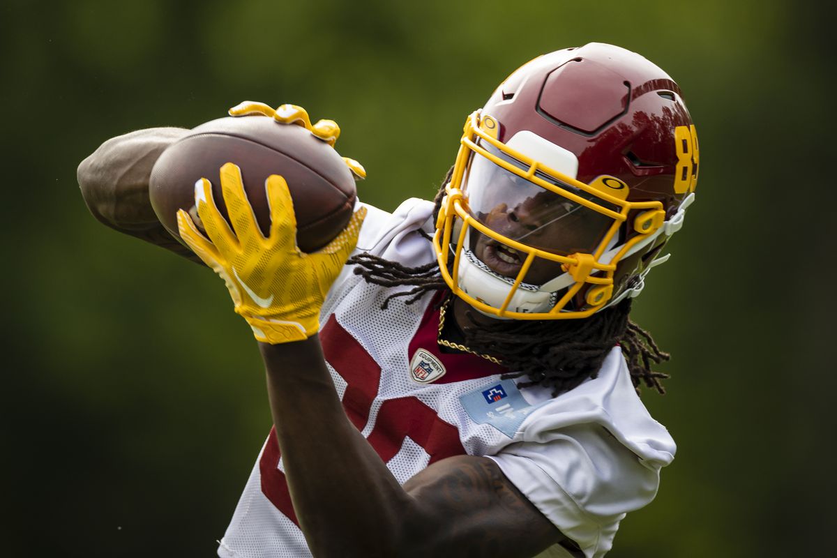 Cam Sims #89 of the Washington Football Team catches a pass during the organized team activity at Inova Sports Performance Center on June 2, 2021 in Ashburn, Virginia.
